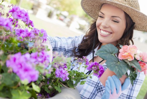 Careful hedge maintenance in a small urban garden