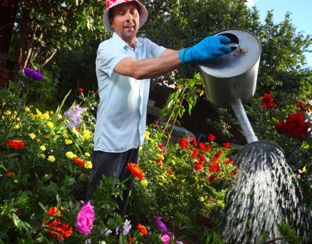 Gardeners Covent Garden team working with safety equipment in a maintained garden